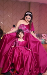 Load image into Gallery viewer, Celebrate the Bond of Elegance with Tanu Khera Designs' Matching Magenta Mother-Daughter Gowns