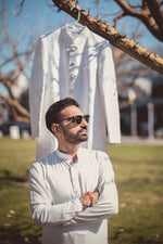 Load image into Gallery viewer, "EMBELLISHED EXCELLENCE MAJESTIC THREADS: TANU KHERA'S ROYAL OFF-WHITE SHERWANI"