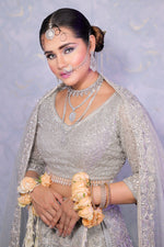 Load image into Gallery viewer, Elegance Unveiled: The Grey Net Reception Lehenga