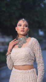 Load image into Gallery viewer, Ivory Opulence: Tanu Khera's Majestic Reception Lehenga with Exquisite Embroidery