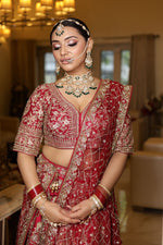 Load image into Gallery viewer, "Antique Royalty: A Masterpiece of Gold and Red Bridal Couture"