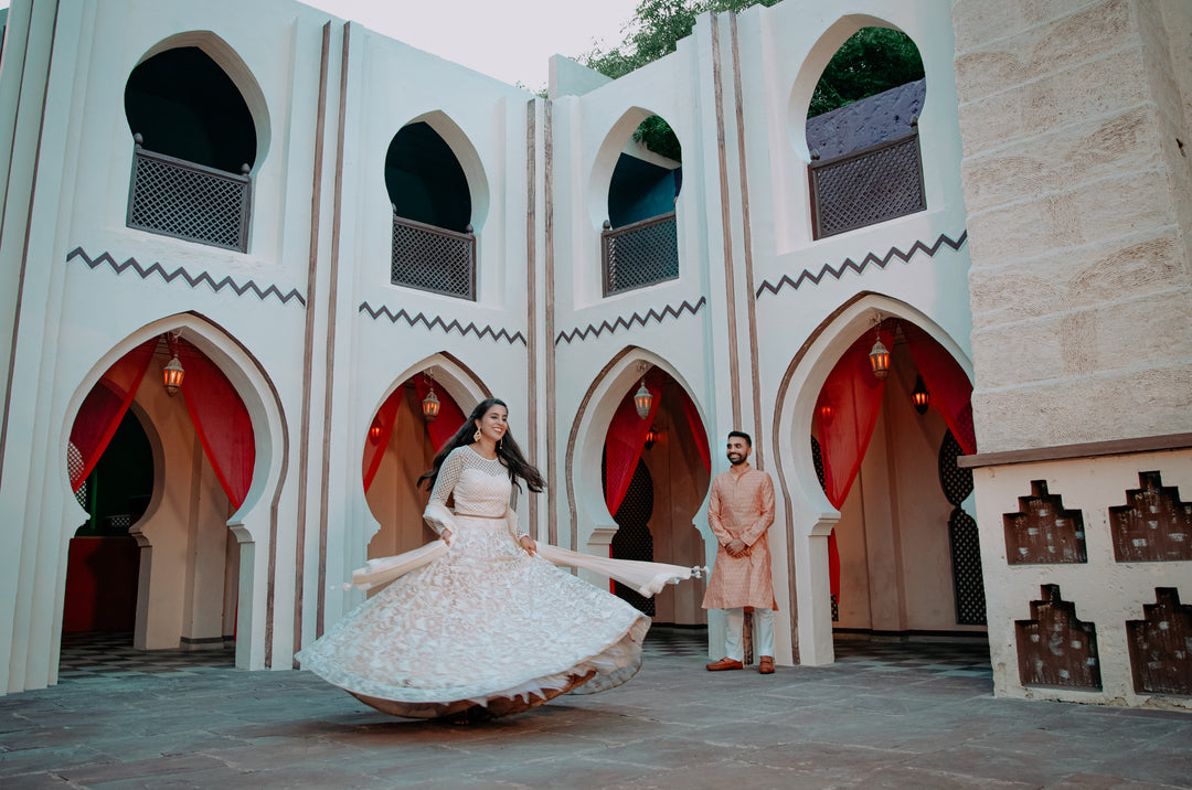 CELESTIAL OPULENCE: THE RESPLENDENT RICH CREAM TULLE SILK LEHENGA BY TANU KHERA DESIGNS"