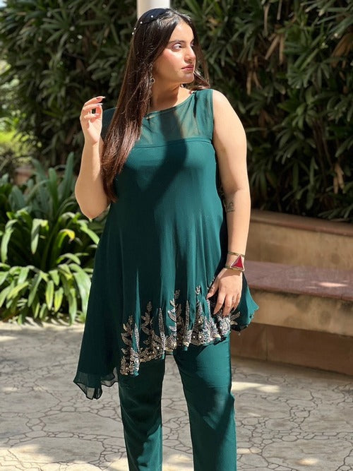 Turquoise Delight: A Flared Tunic with Timeless Embroidery