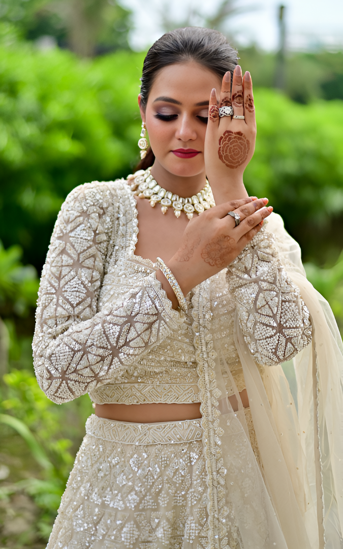 Ivory Dream: Tanu Khera's Exquisite Reception Net Lehenga