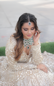 THE RECEPTION LEHENGA ADORNED WITH HEAVY SEQUINS BY TANU KHERA DESIGNS