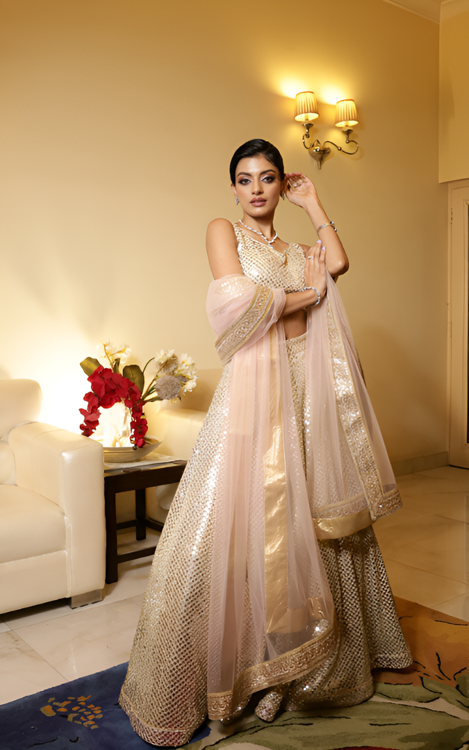 Golden Glamour: Heavy Sequins Embroidered Lehenga with Organza Dupatta