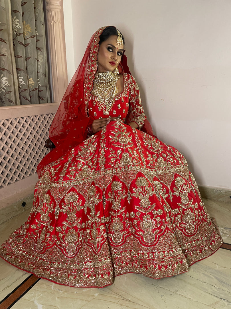 "CRIMSON ELEGANCE: TANU KHERA'S EXQUISITE GEORGETTE BRIDAL LEHENGA