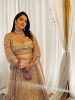 Load image into Gallery viewer, Elegance Redefined: Copperish Gold Lehenga by Tanu Khera Designs
