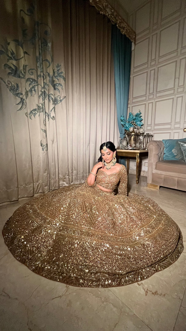 THE COPPER ORGANZA RECEPTION LEHENGA BY TANU KHERA DESIGNS