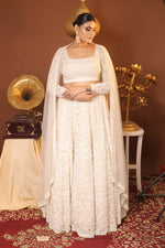 Load image into Gallery viewer, THE IVORY RECEPTION NET LEHENGA BY TANU KHERA DESIGNS&quot; (Copy)
