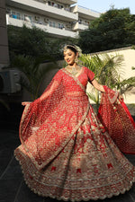 Load image into Gallery viewer, &quot;Exquisite Grandeur: The Multicoloured Bridal Velvet Lehnga by Tanu Khera Designs&quot;
