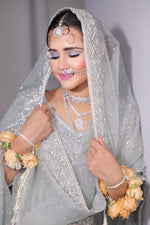 Load image into Gallery viewer, Elegance Unveiled: The Grey Net Reception Lehenga
