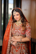 Load image into Gallery viewer, Celestial Splendor: Tanu Khera&#39;s Exquisite Bridal Lehenga in Organza and Zardozi Embroidery
