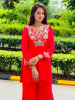 Load image into Gallery viewer, Radiant Coral Orange Georgette Sharara Suit with Exquisite Rose Gold Embroidery
