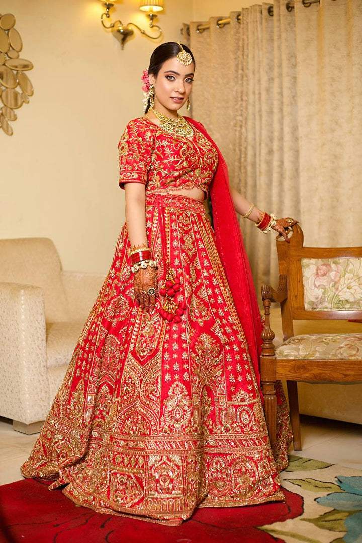 Opulent Red Bridal Lehenga – A Regal Vision