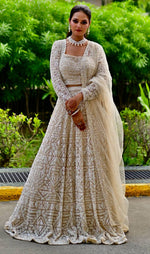 Load image into Gallery viewer, Ivory Dream: Tanu Khera&#39;s Exquisite Reception Net Lehenga
