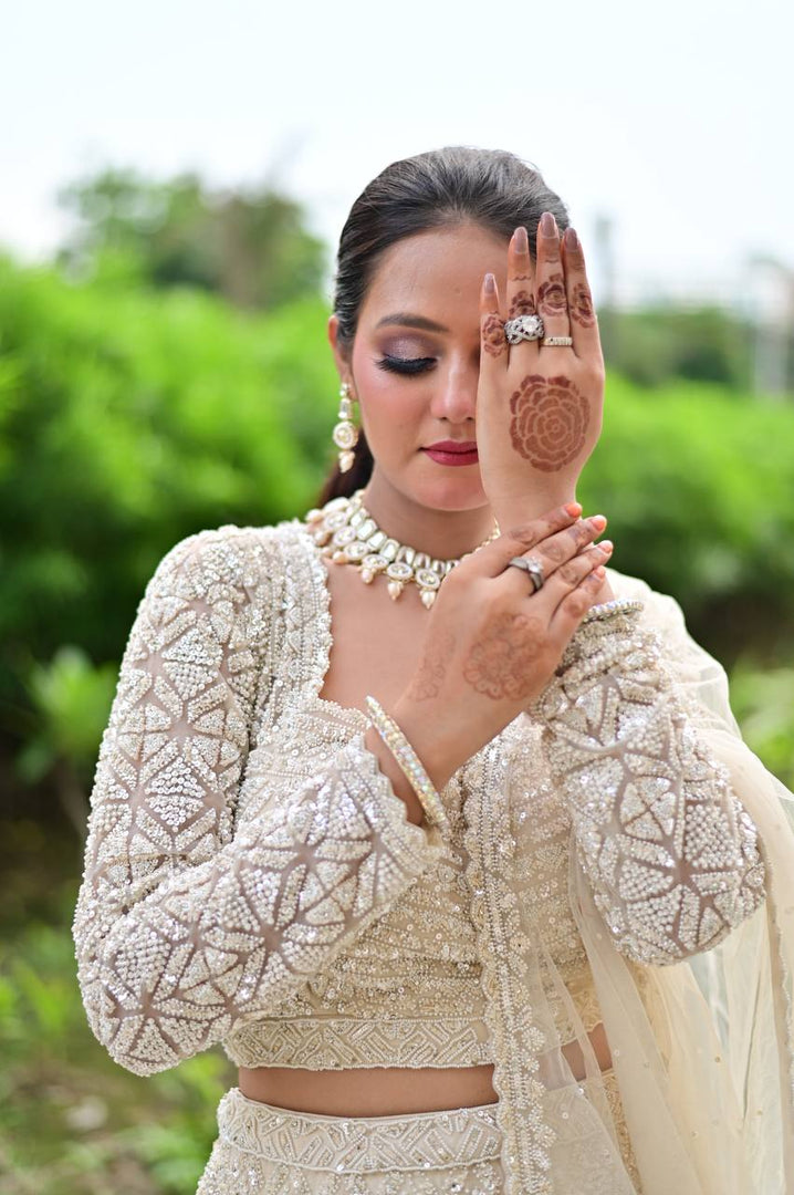 Ivory Dream: Tanu Khera's Exquisite Reception Net Lehenga